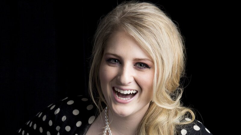 woman with blonde hair smiling