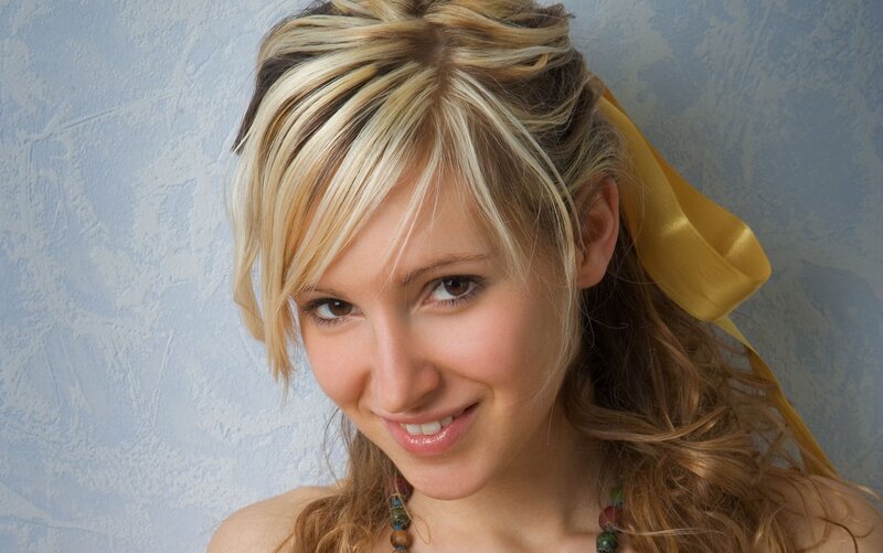 woman with blonde hair smiling