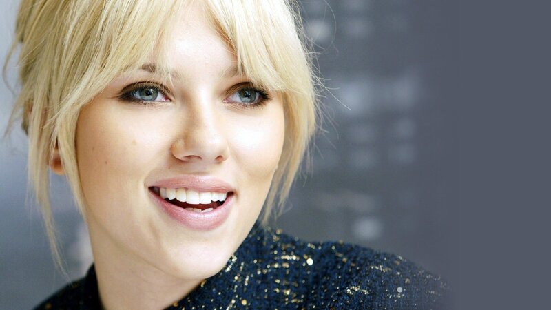 woman with blonde hair smiling