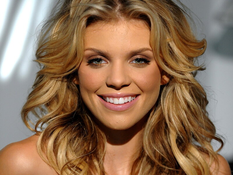 woman with blonde hair smiling