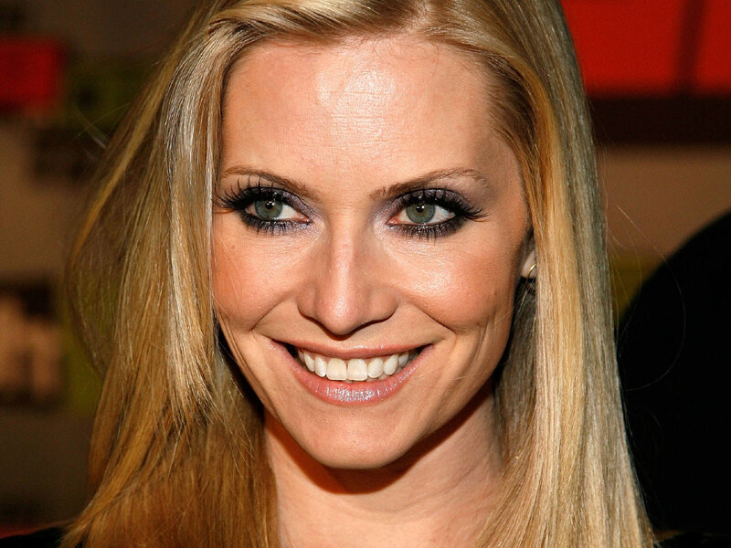 woman with blonde hair smiling