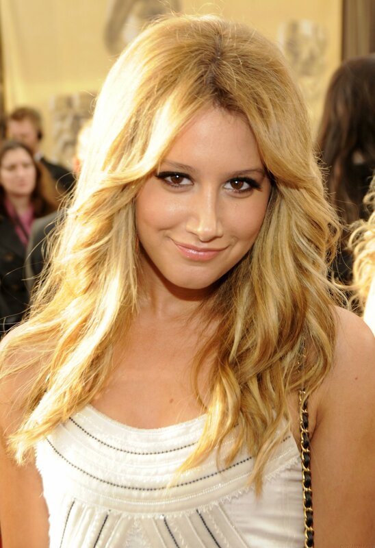 woman with blonde hair smiling