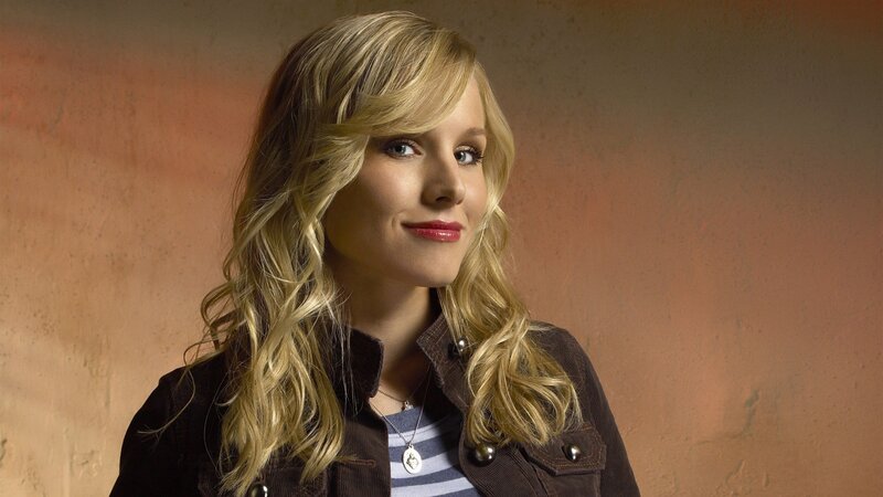 woman with blonde hair smiling