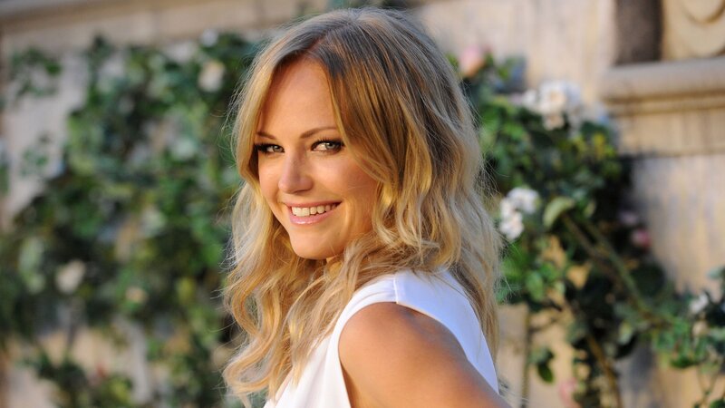 woman with blonde hair smiling