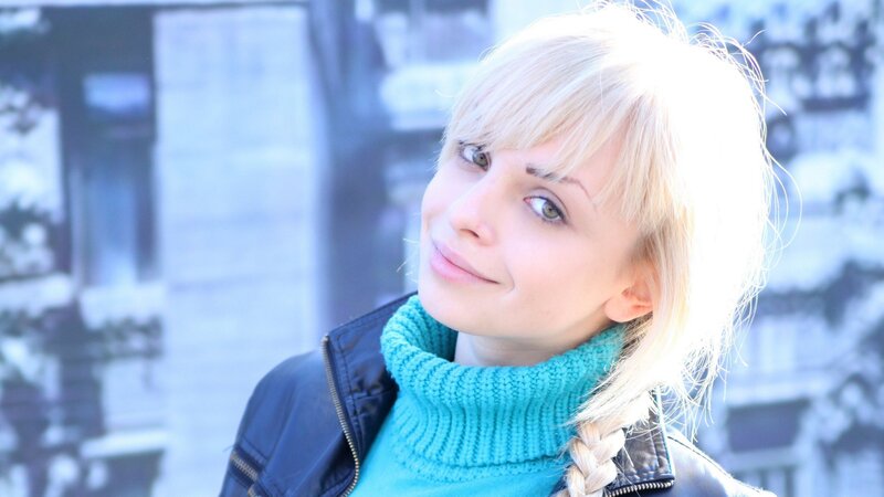 woman with blonde hair smiling