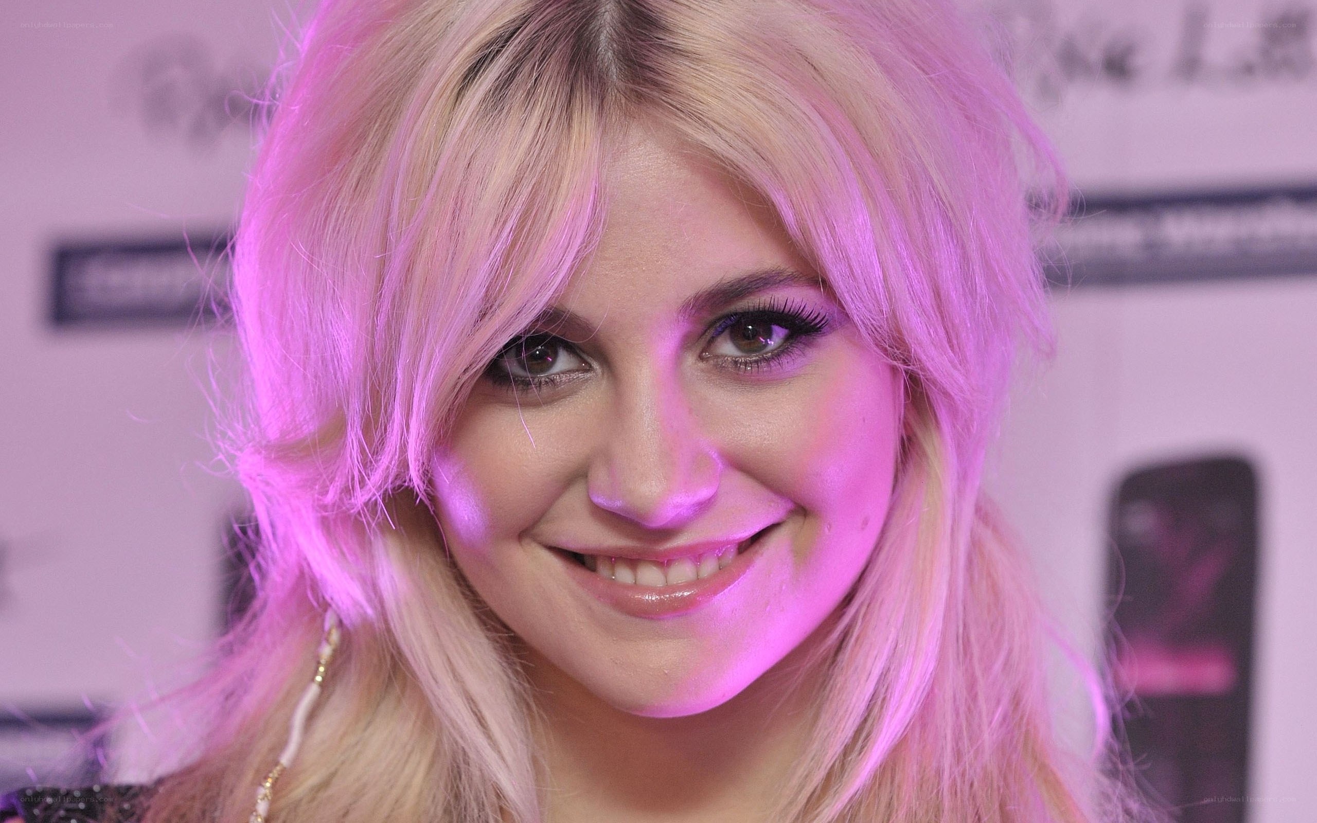 woman with blonde hair smiling