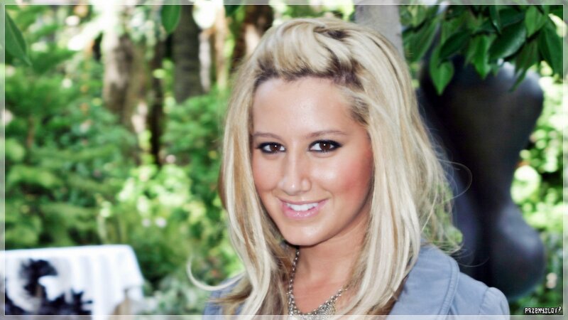 woman with blonde hair smiling