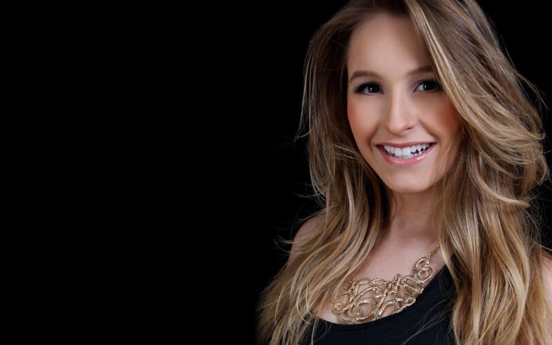 woman with blonde hair smiling