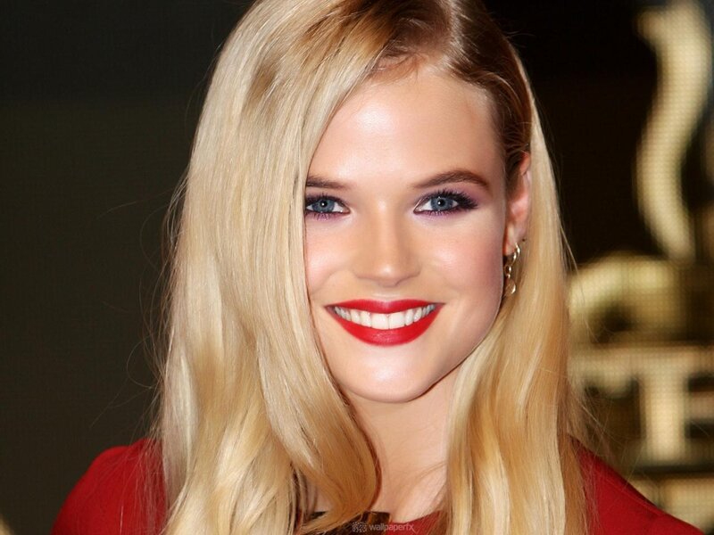 Woman with Blonde Hair — Smiling, Photograph, Red Lipstick, Gold Earrings, Red Top