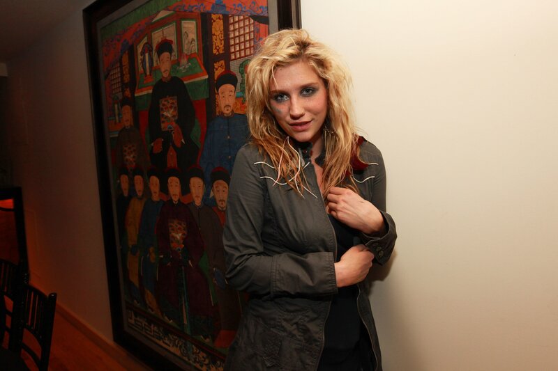 woman with blonde hair standing