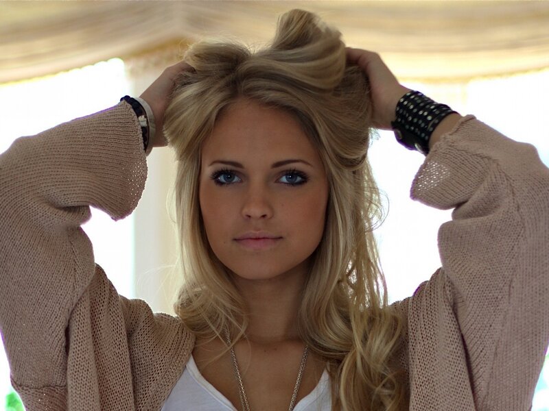 woman with blonde hair styling
