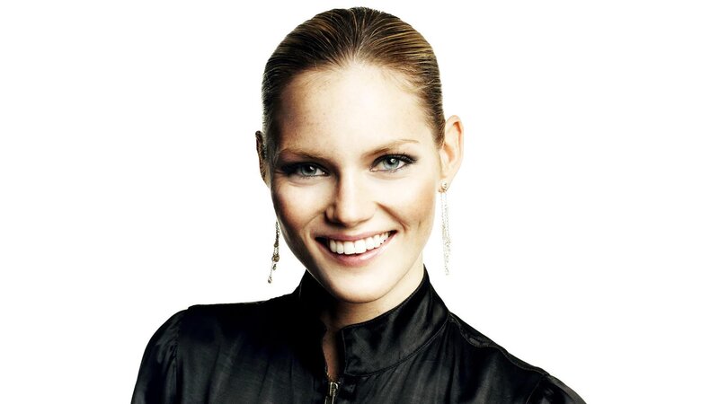 Woman with Blonde Hair — White, Smiling, Photograph, Earrings, Black Jacket