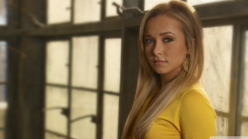 Woman with Blonde Hair — Yellow, Serious