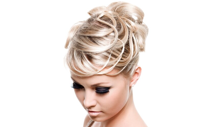 woman with blonde updo hairstyle