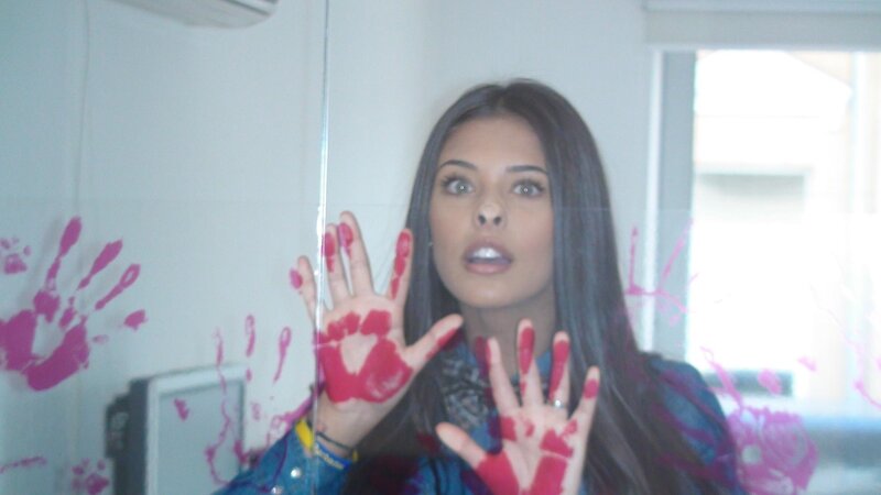 woman with blood-stained hands