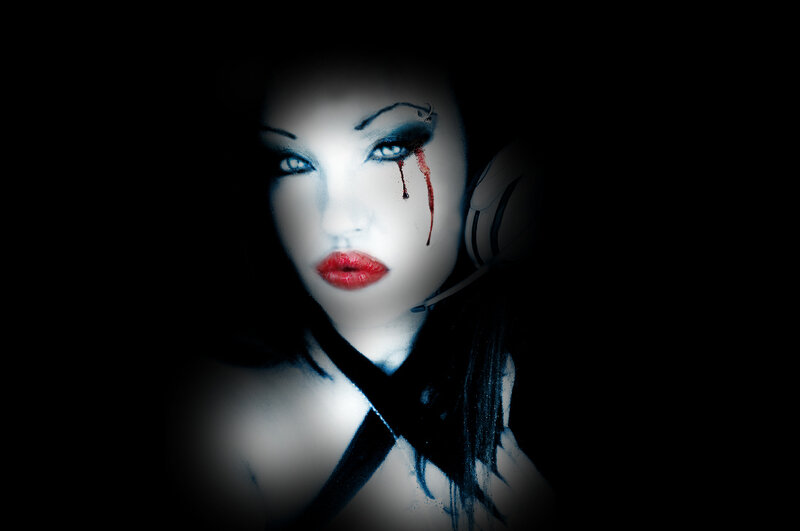 woman with blood tear makeup