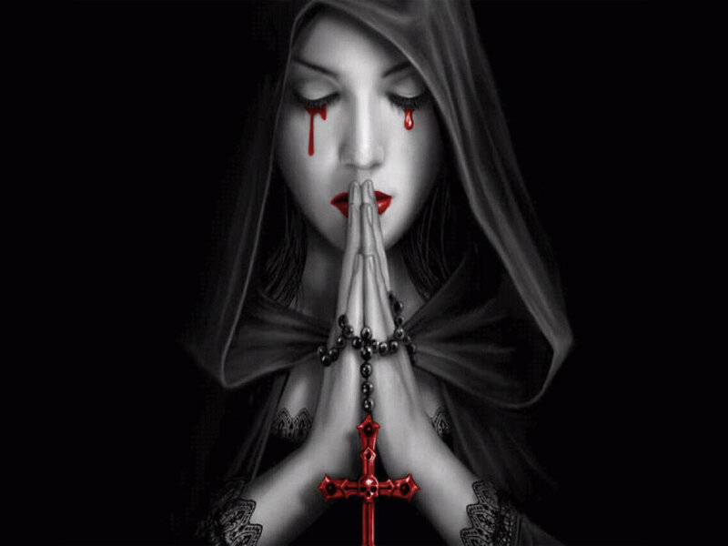 woman with blood tears praying