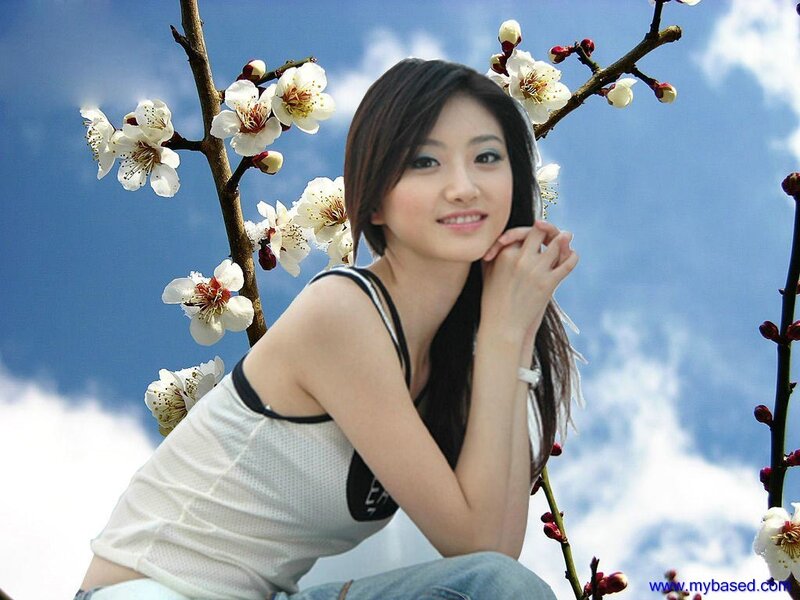 woman with blossoming branches