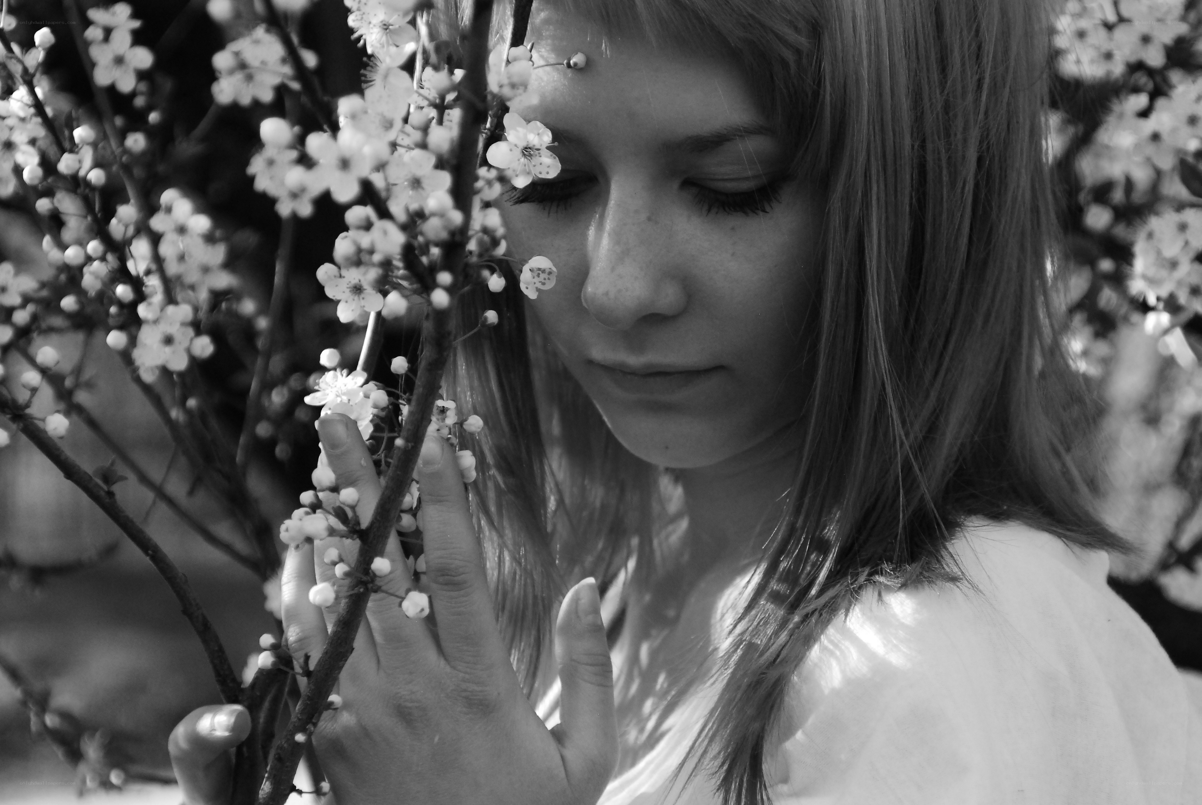 woman with blossoming branches