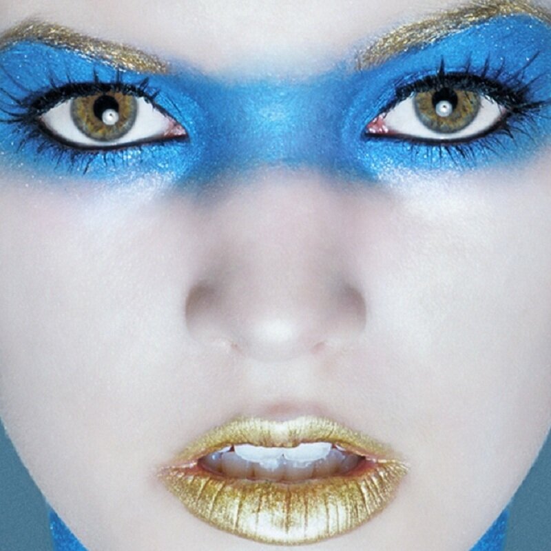 Woman with Blue and Gold Makeup