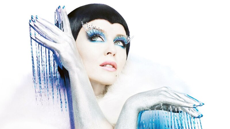 woman with blue and silver makeup
