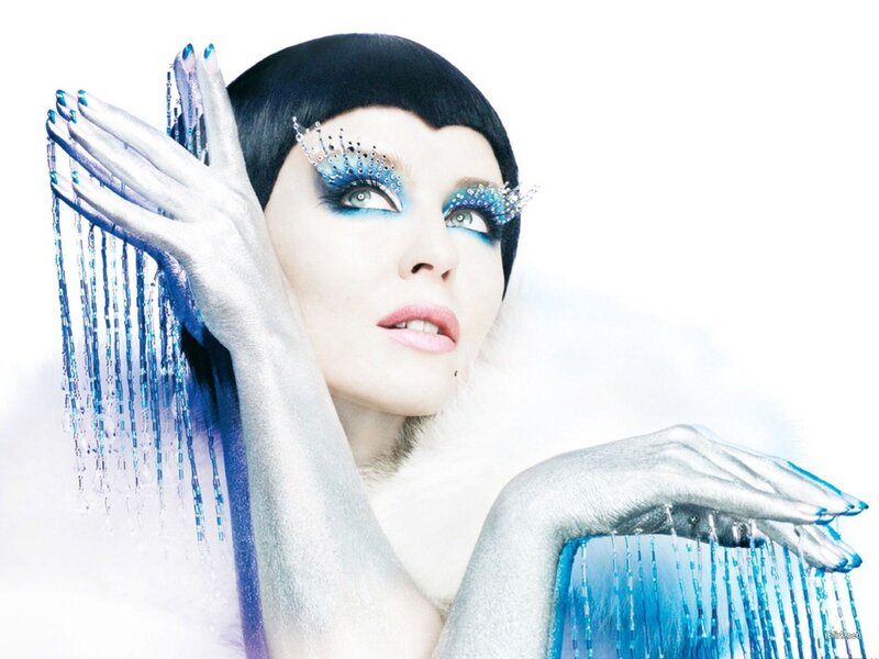 woman with blue and silver makeup
