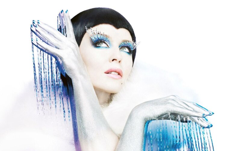 woman with blue and silver makeup