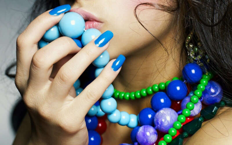 Woman with Blue Beads