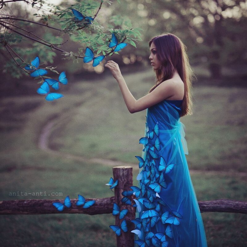Woman with Blue Butterflies — Serene, Sunset