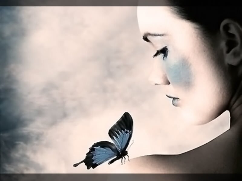 woman with blue butterfly