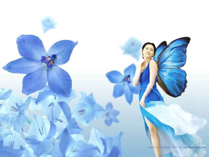 woman with blue butterfly wings
