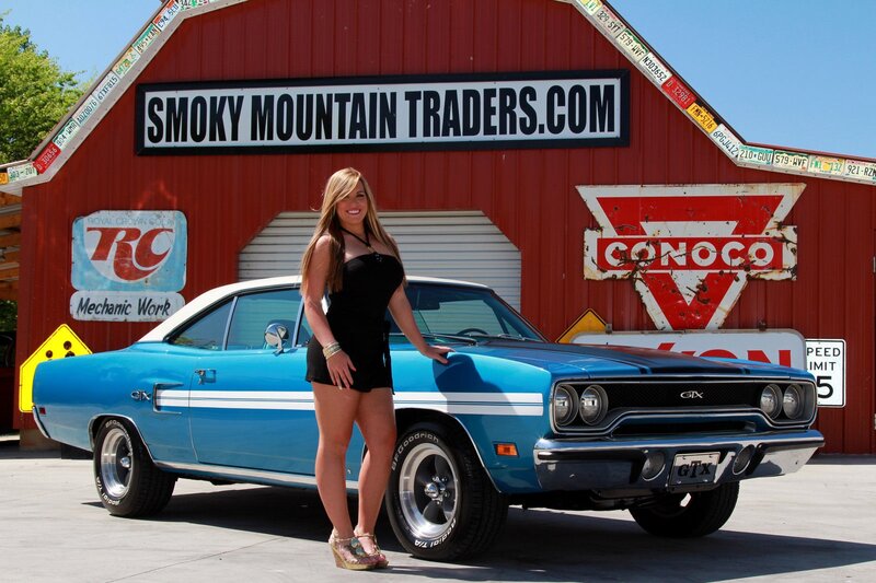 Woman with Blue Car — Bright, Afternoon