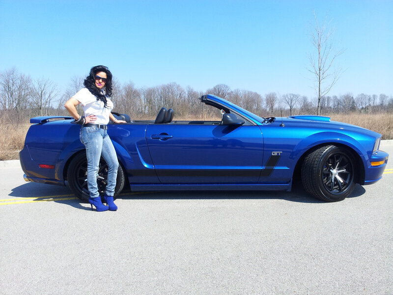 Woman with Blue Car — Bright