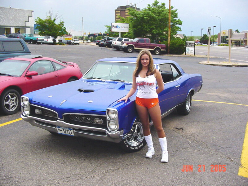 Woman with Blue Car — Casual