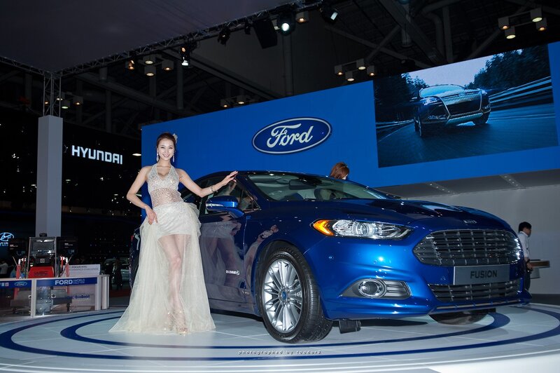 Woman with Blue Car — Formal