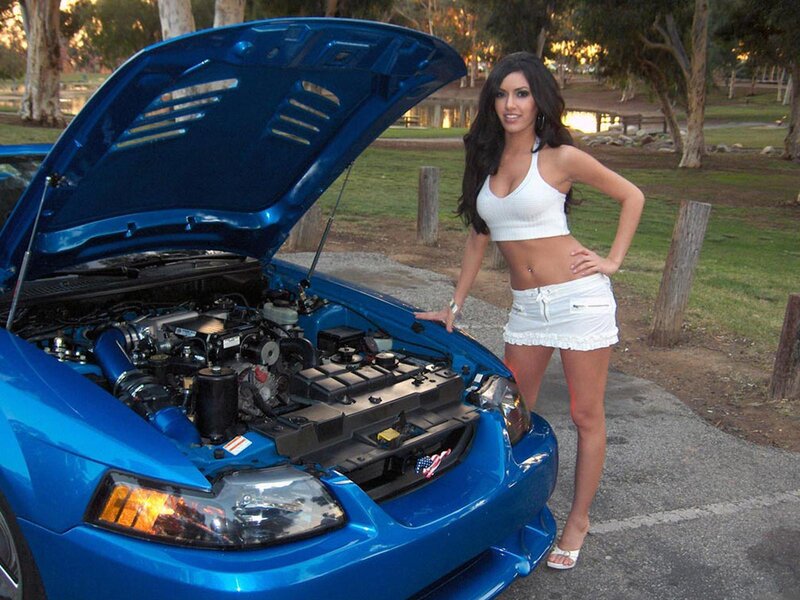 Woman with Blue Car — Relaxed