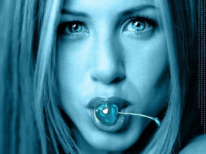 woman with blue cherry in mouth