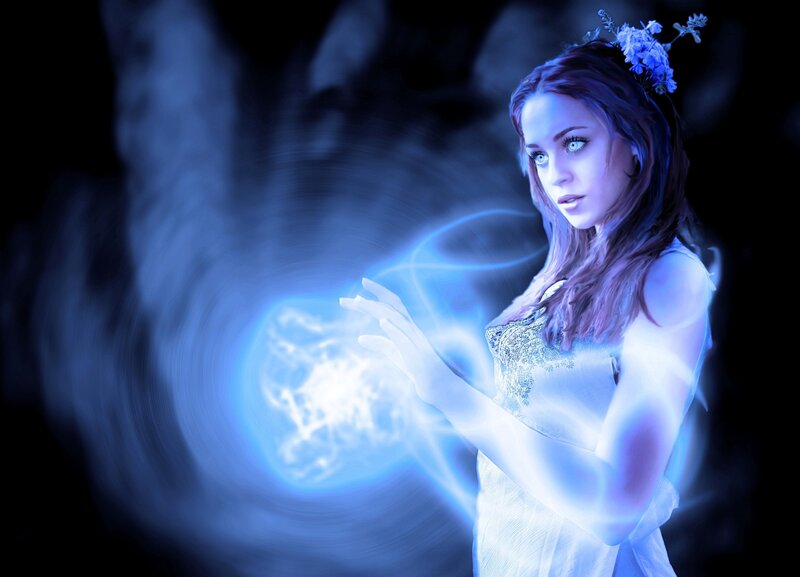 woman with blue energy sphere