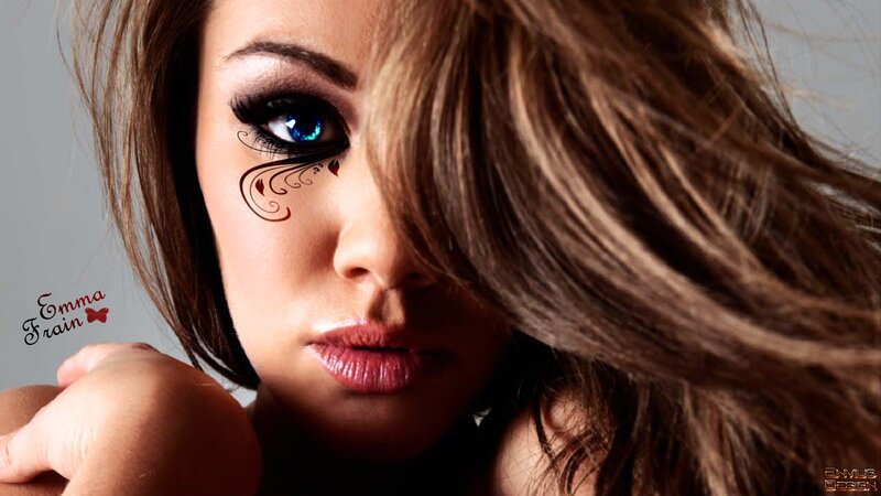 woman with blue eye and face art