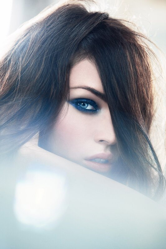 woman with blue eye makeup