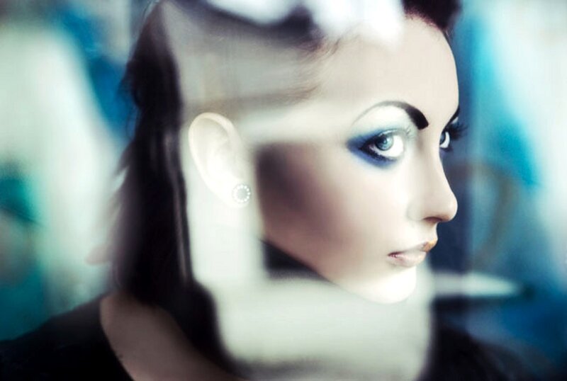 woman with blue eye makeup