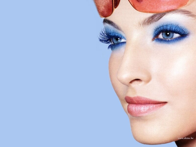 woman with blue eye makeup