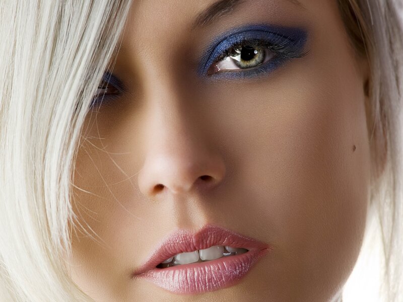 woman with blue eye makeup