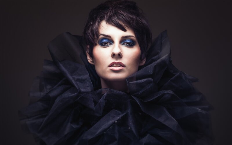 woman with blue eye makeup