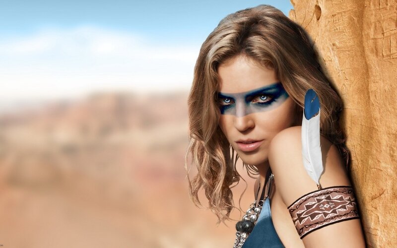 woman with blue eye makeup