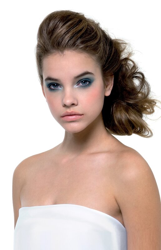 woman with blue eye makeup