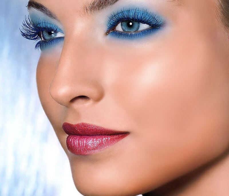 woman with blue eye makeup