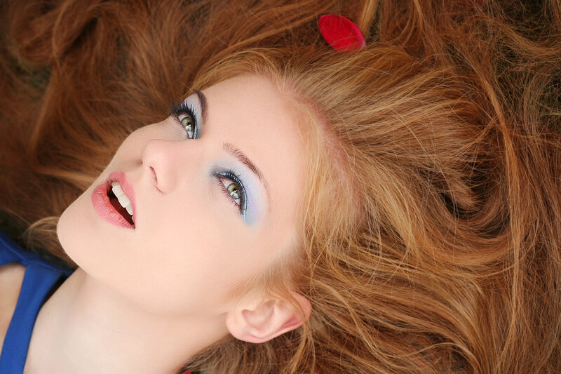 woman with blue eye makeup