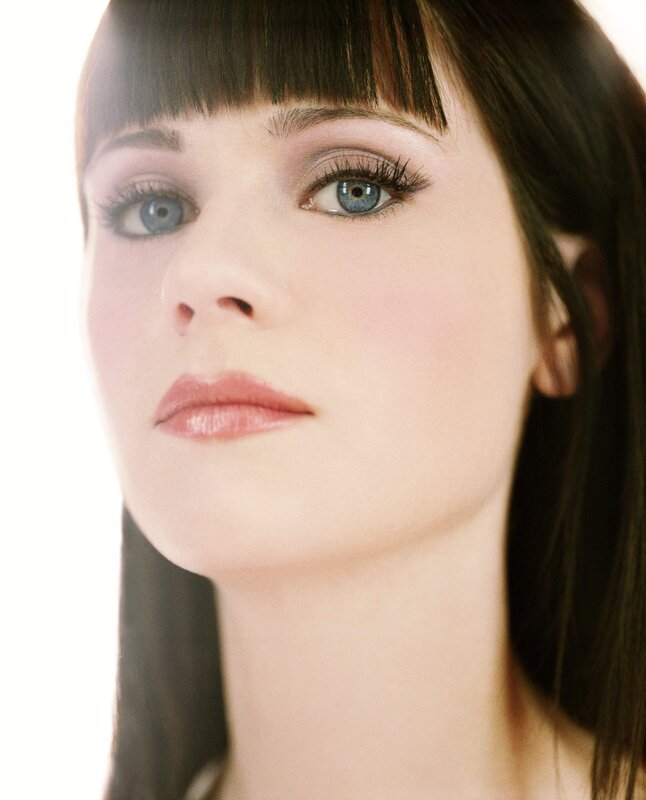 woman with blue eyes and bangs