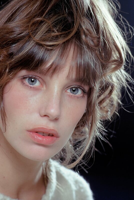 woman with blue eyes and bangs